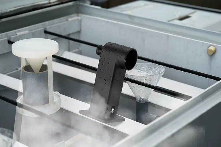 Lab technician testing bathtub faucet